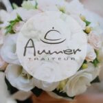 Logo de Aumer Traiteur, entreprise familiale de traiteur haut de gamme fondée par le chef Franck Aumer, spécialisé dans les prestations culinaires raffinées et la cuisson à la broche avec tournebroche Mobi-Grill